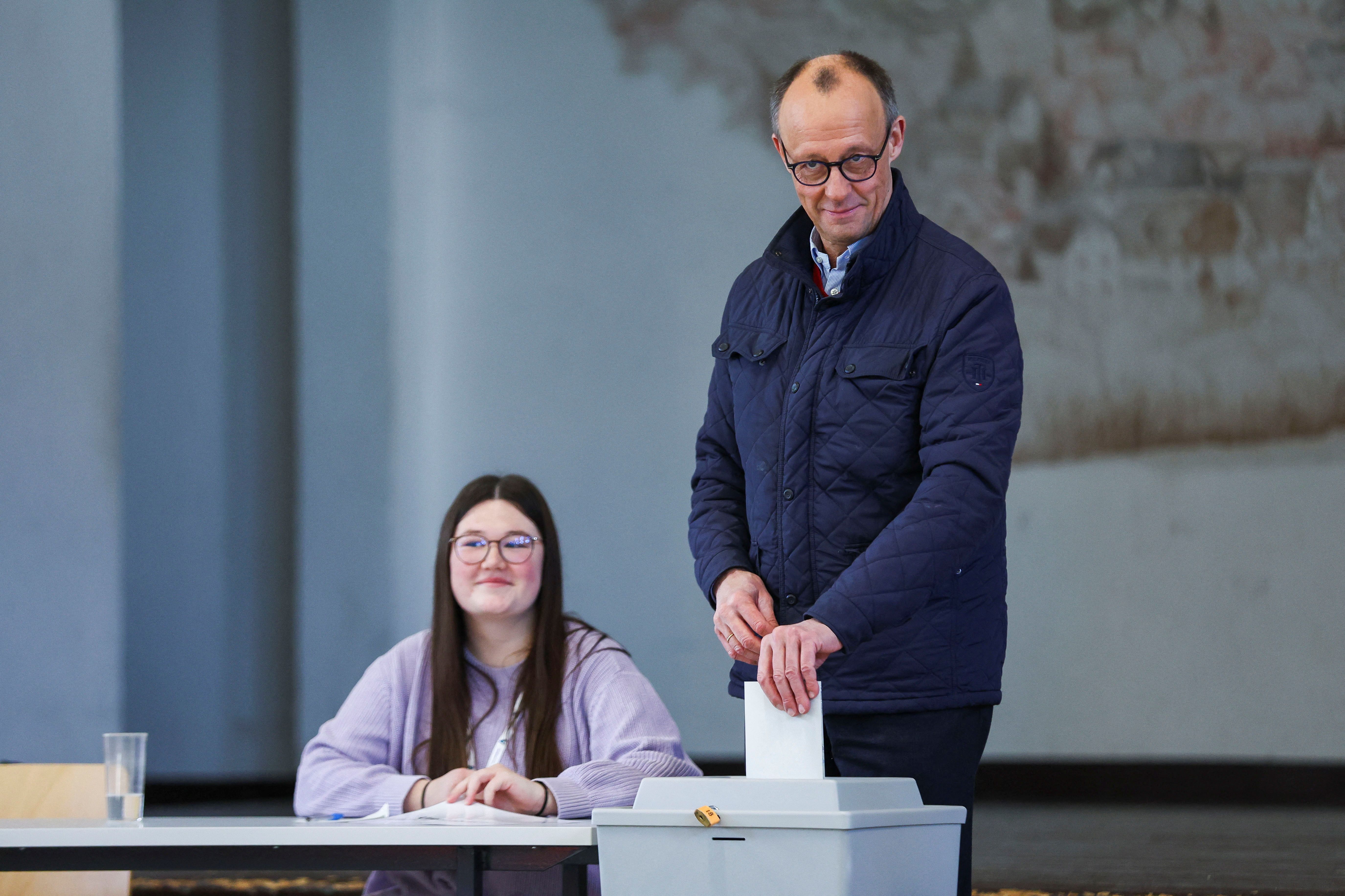 German conservative candidate for chancellor and Christian Democratic Union (CDU) party leader Friedrich Merz votes during the 2025 general election.