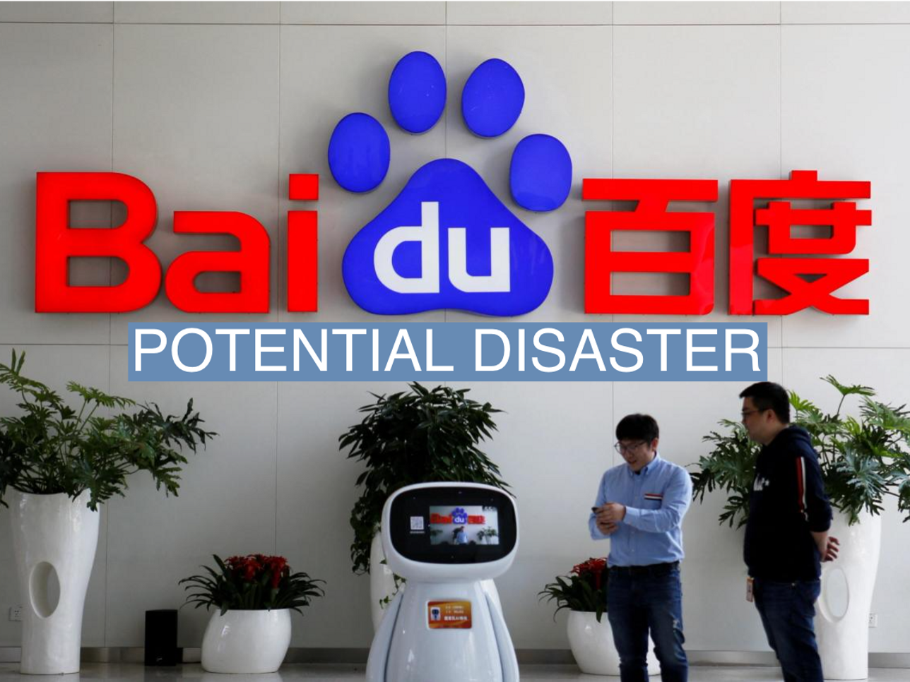 Men interact with a Baidu AI robot near the company logo at its headquarters in Beijing, China April 23, 2021. REUTERS/Florence Lo/File Photo