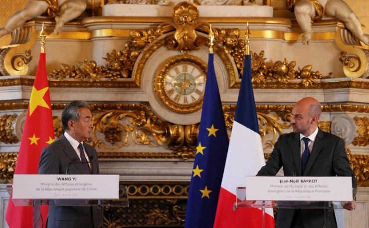Chinese Foreign Minister Wang Yi and French Minister for Europe and Foreign Affairs Jean-Noel Barrot attend a press conference at the foreign ministry in Paris.