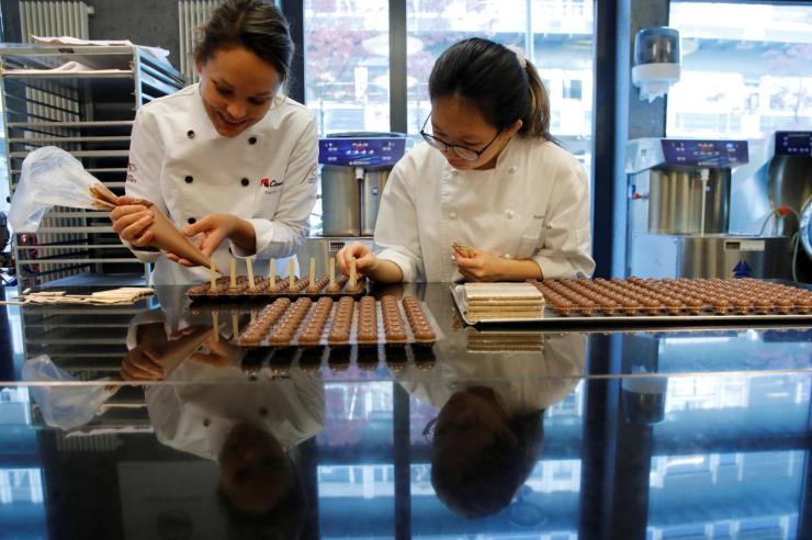 Barry Callebaut employees preparing chocolates.