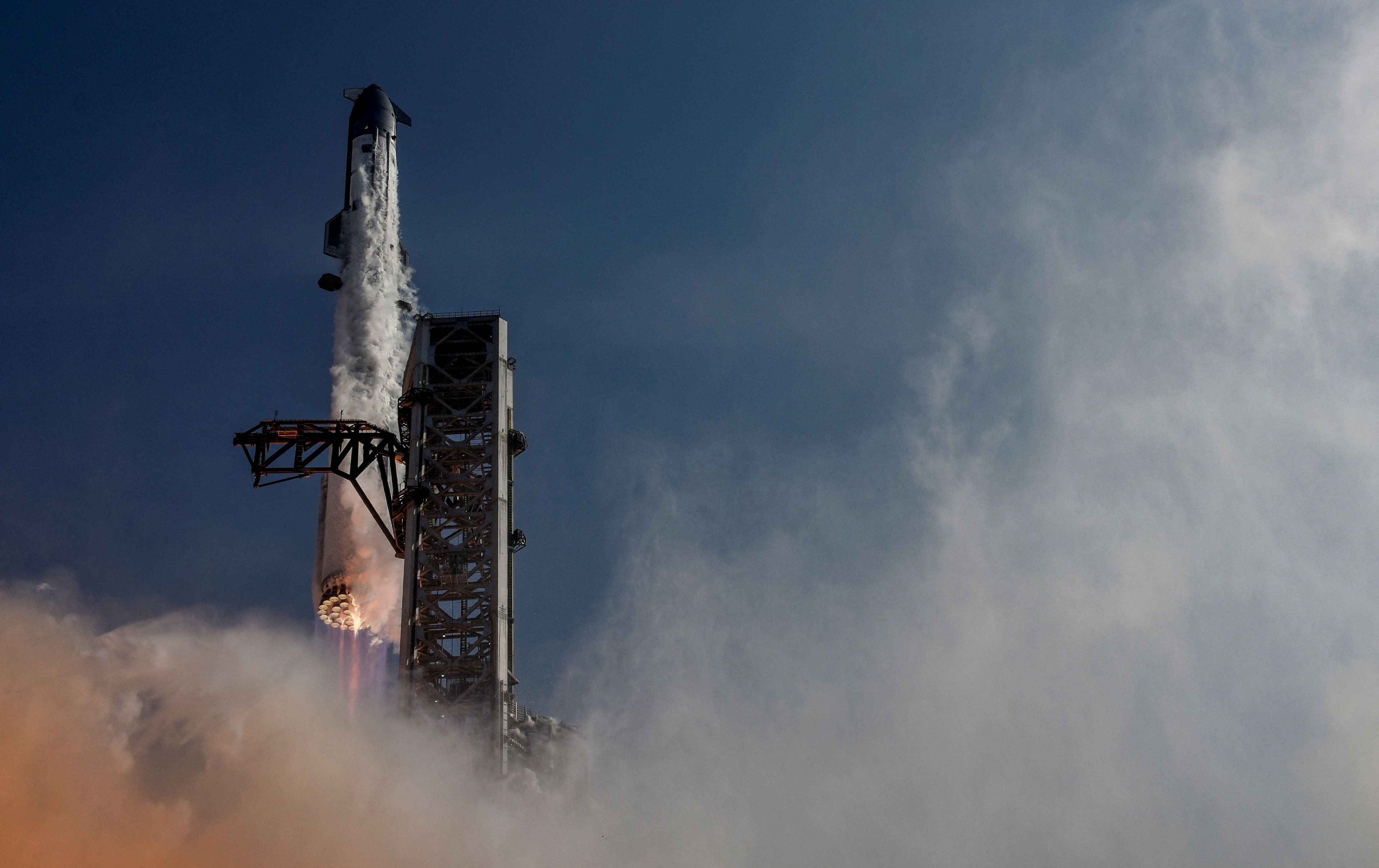 The SpaceX Starship and Super Heavy Booster lifts off on its 12th test flight from the SpaceX launch complex in Starbase, Texas.