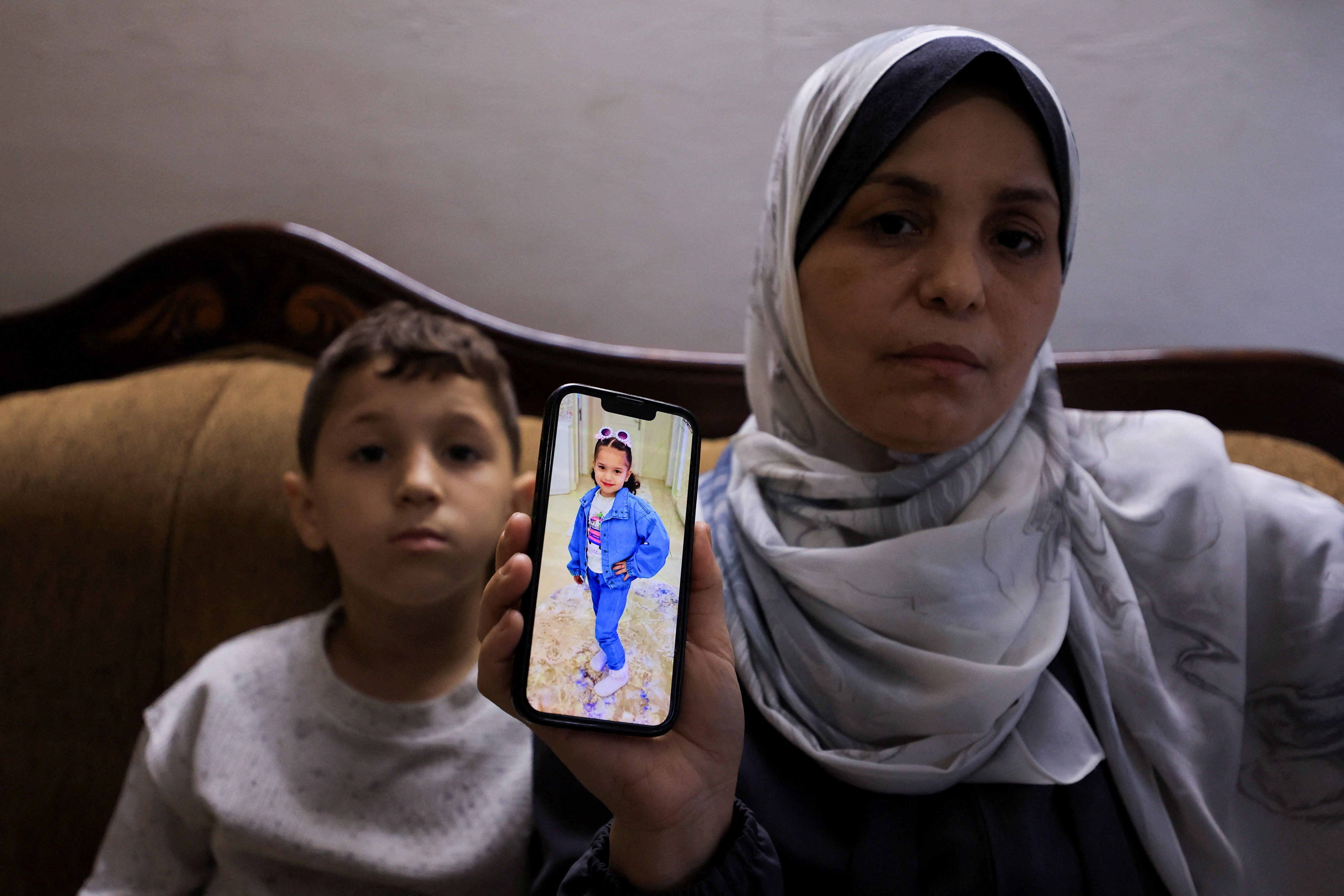 Hind Rajab’s grandmother shows a photo of the 5 year old who was killed by the Israeli military