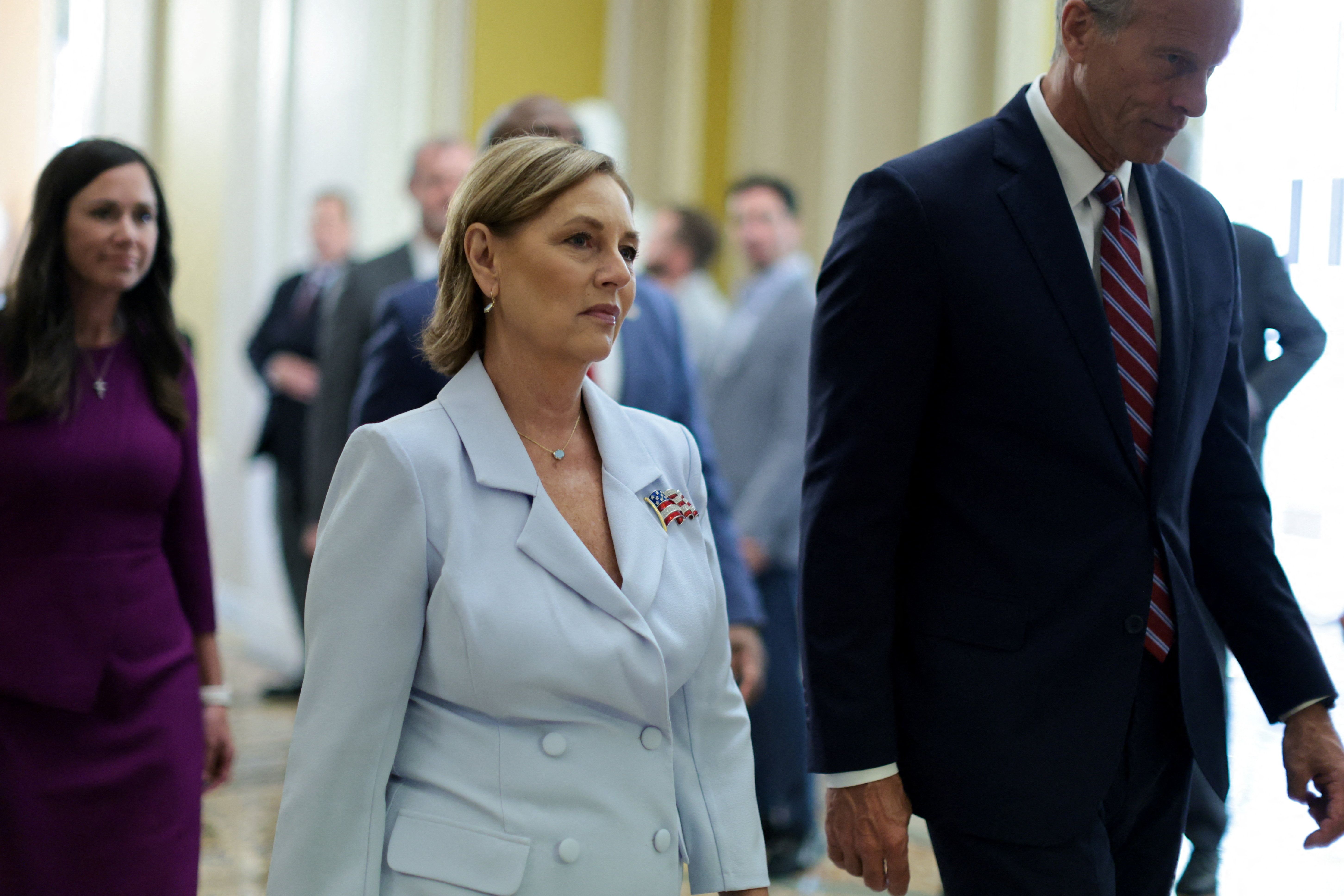 U.S. Senator-Designate Darline Graham, sister of late Senator Lindsey Graham, walks on the day of a ceremonial swearing-in event with Senate Majority Leader John Thune (R-SD) on Capitol Hill in Washington, D.C., U.S.