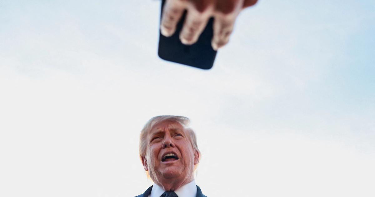 Trump defends Iran deal after markets forced his hand