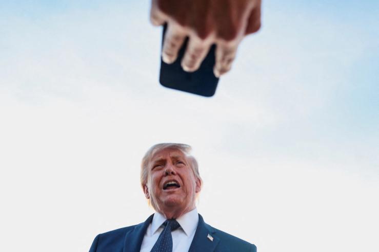 President Donald Trump answers questions