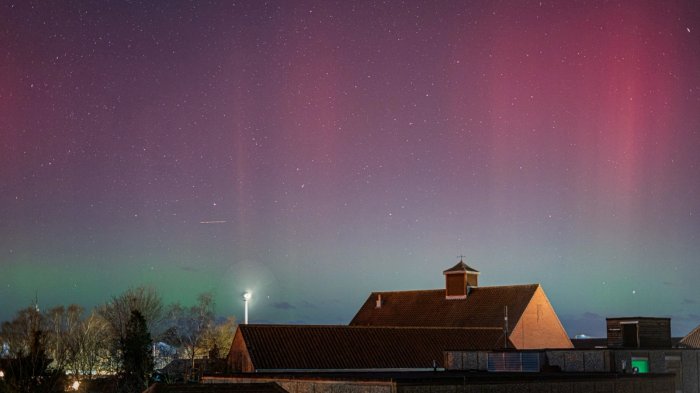 Northern lights are seen in the sky over Swaffham, Britain, February 26, 2023, in this still image obtained from a social media video. James Billings Photography/via REUTERS