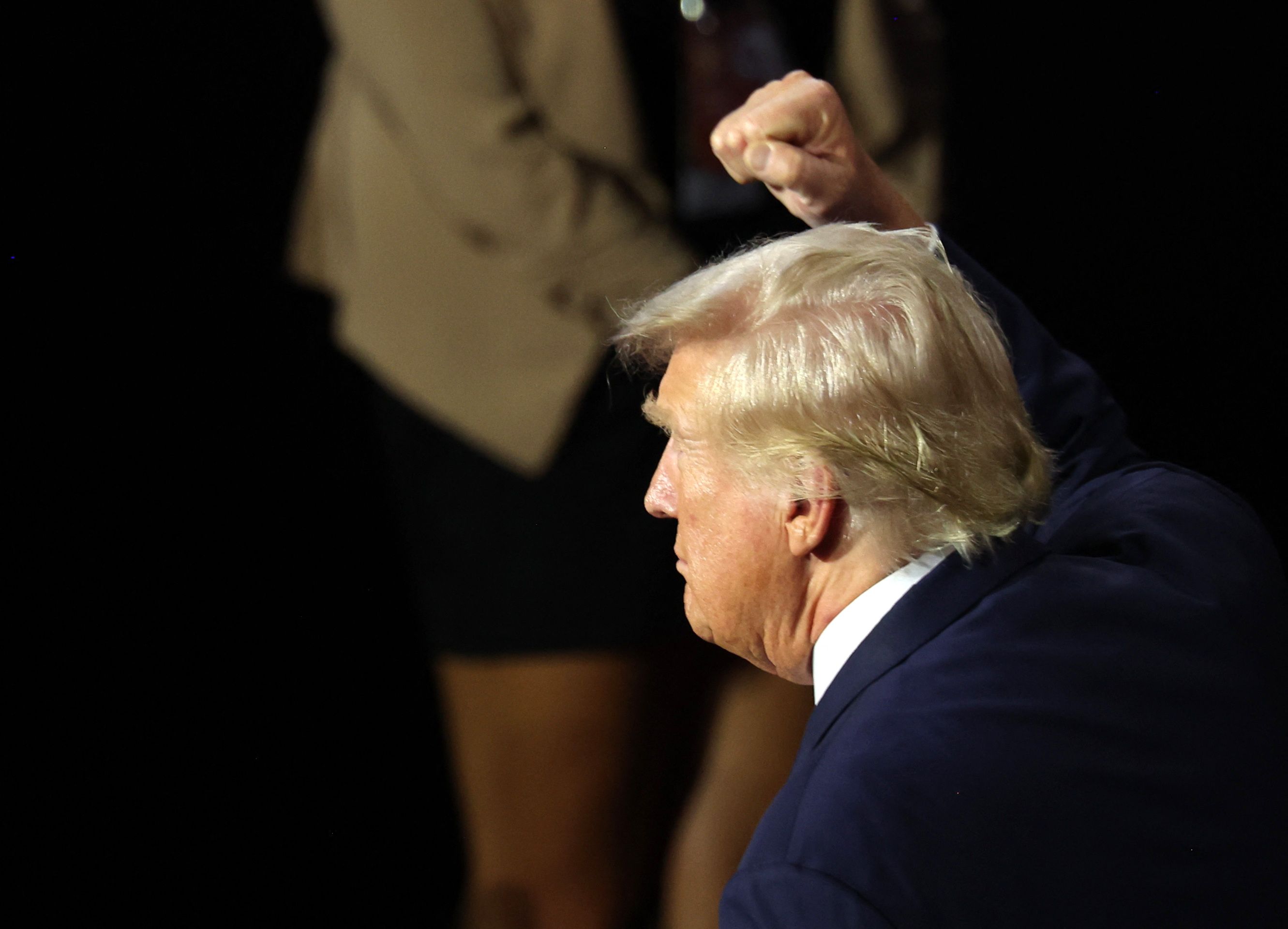 Republican presidential nominee and former U.S. President Donald Trump gestures as he departs at the conclusion of Day 2 of the Republican National Convention (RNC), at the Fiserv Forum in Milwaukee, Wisconsin, U.S., July 16, 2024. REUTERS/Mike Segar
