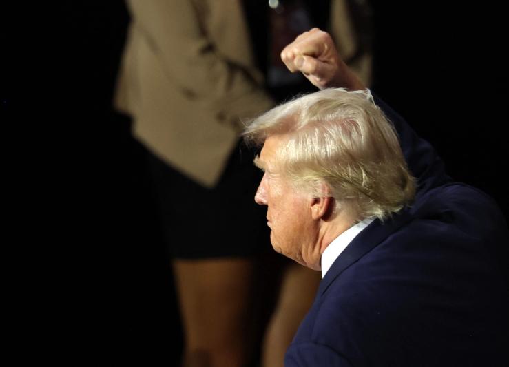 Republican presidential nominee and former U.S. President Donald Trump gestures as he departs at the conclusion of Day 2 of the Republican National Convention (RNC), at the Fiserv Forum in Milwaukee, Wisconsin, U.S., July 16, 2024. REUTERS/Mike Segar