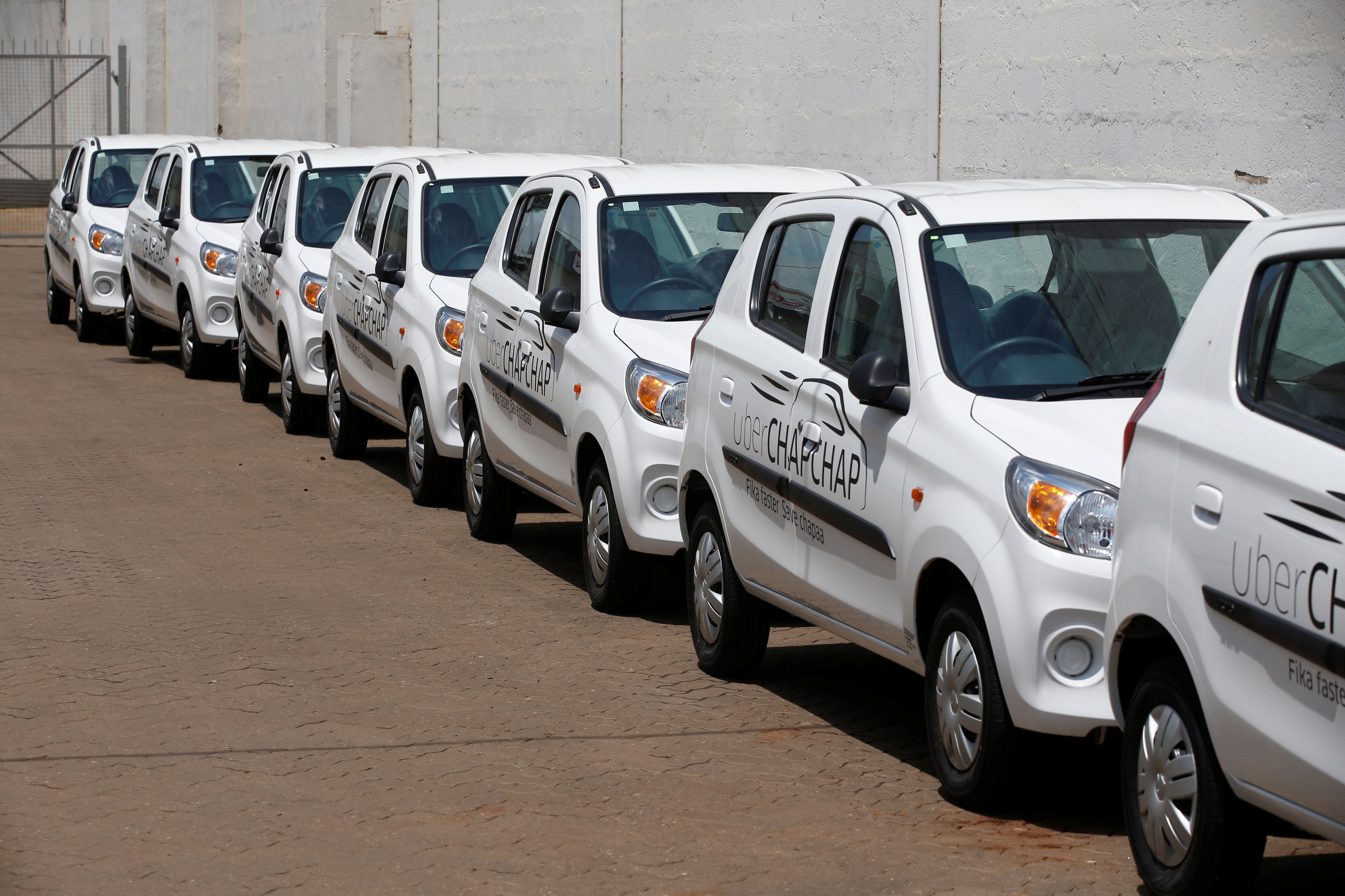 Suzuki cars branded with Uber stickers in a showroom in Nairobi on Oct. 30, 2018. 