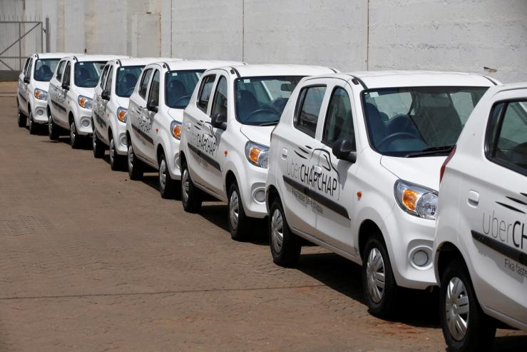 Suzuki cars branded with Uber stickers in a showroom in Nairobi on Oct. 30, 2018.
