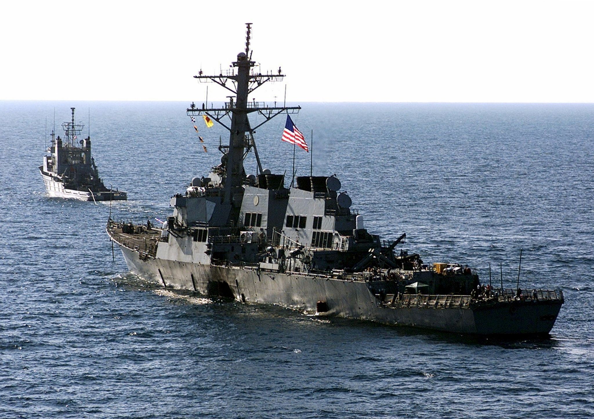 The US Navy destroyer USS Cole (DDG 67) is towed away from the port city of Aden, Yemen, in this file picture taken October 29, 2000.