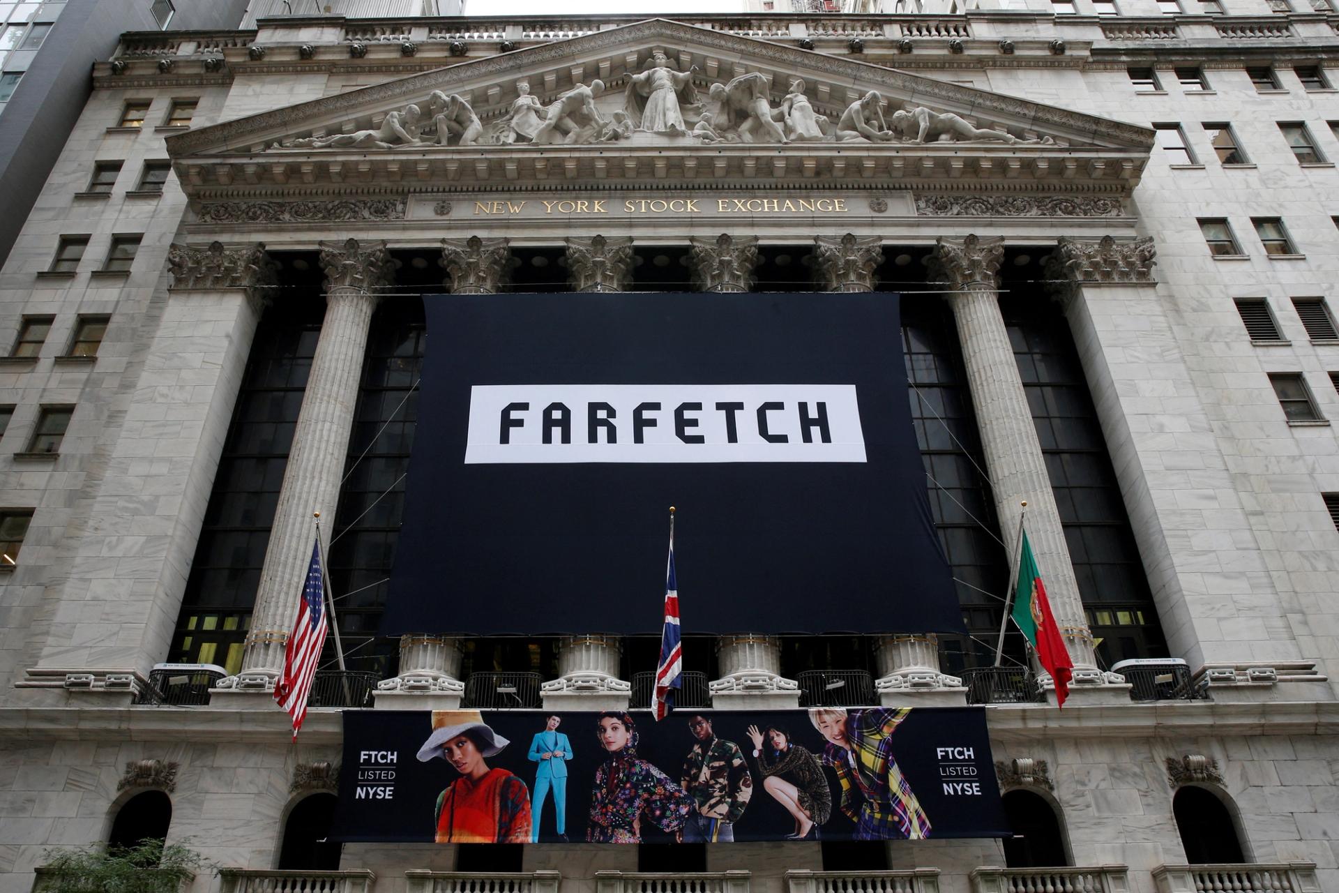 A banner to celebrate the IPO of online fashion house Farfetch is displayed on the facade of the of the New York Stock Exchange (NYSE) in New York, U.S., September 21, 2018. 