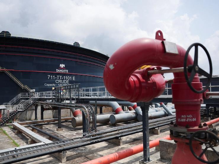 A Dangote crude oil tank is seen inside the Dangote Industries oil refinery.