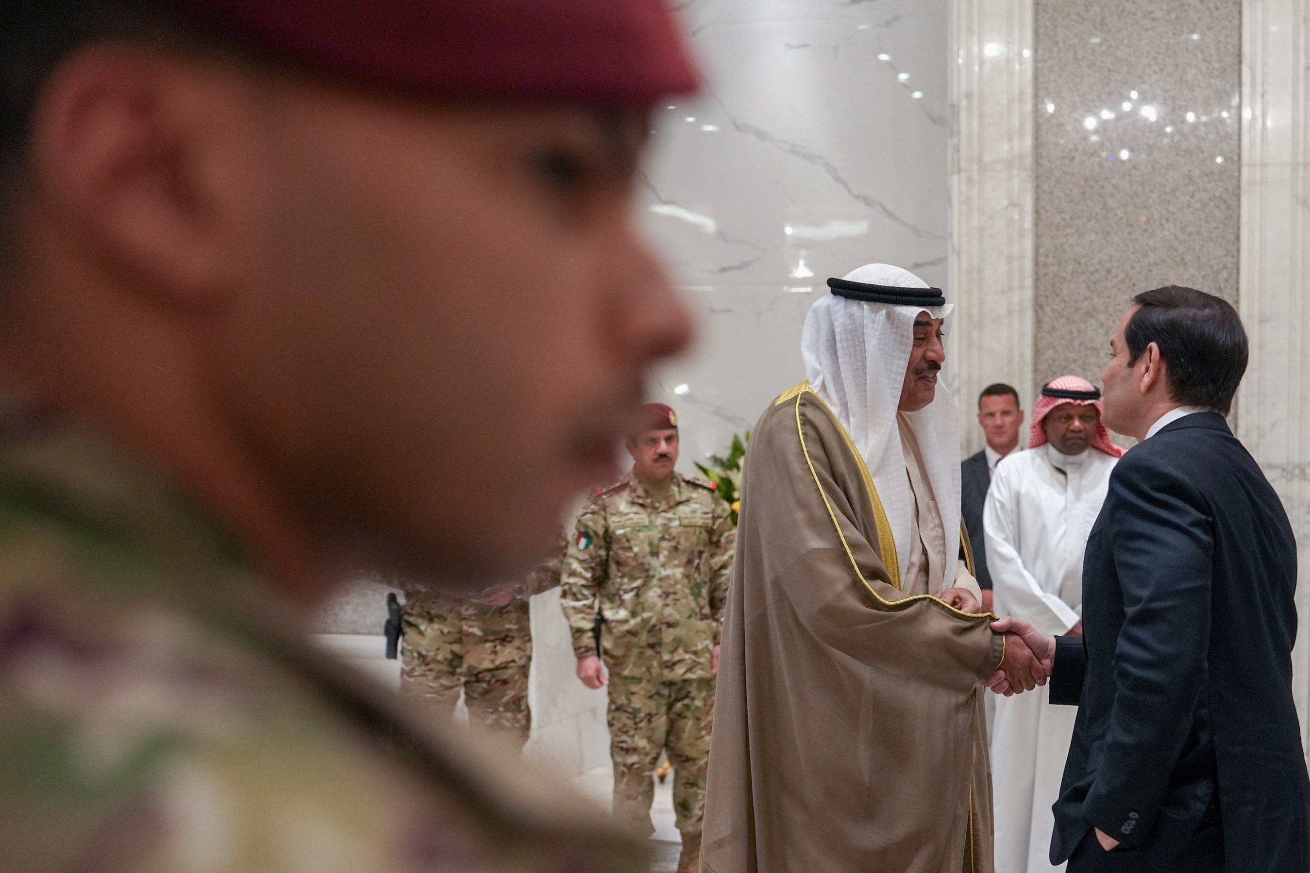 U.S. Secretary of State Marco Rubio and Kuwait’s Crown Prince Sheikh Sabah Khaled Al-Hamad Al-Sabah shake hands