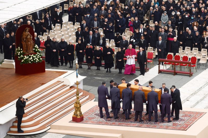 The coffin of former Pope Benedict is carried during his funeral, in St. Peter's Square at the Vatican.