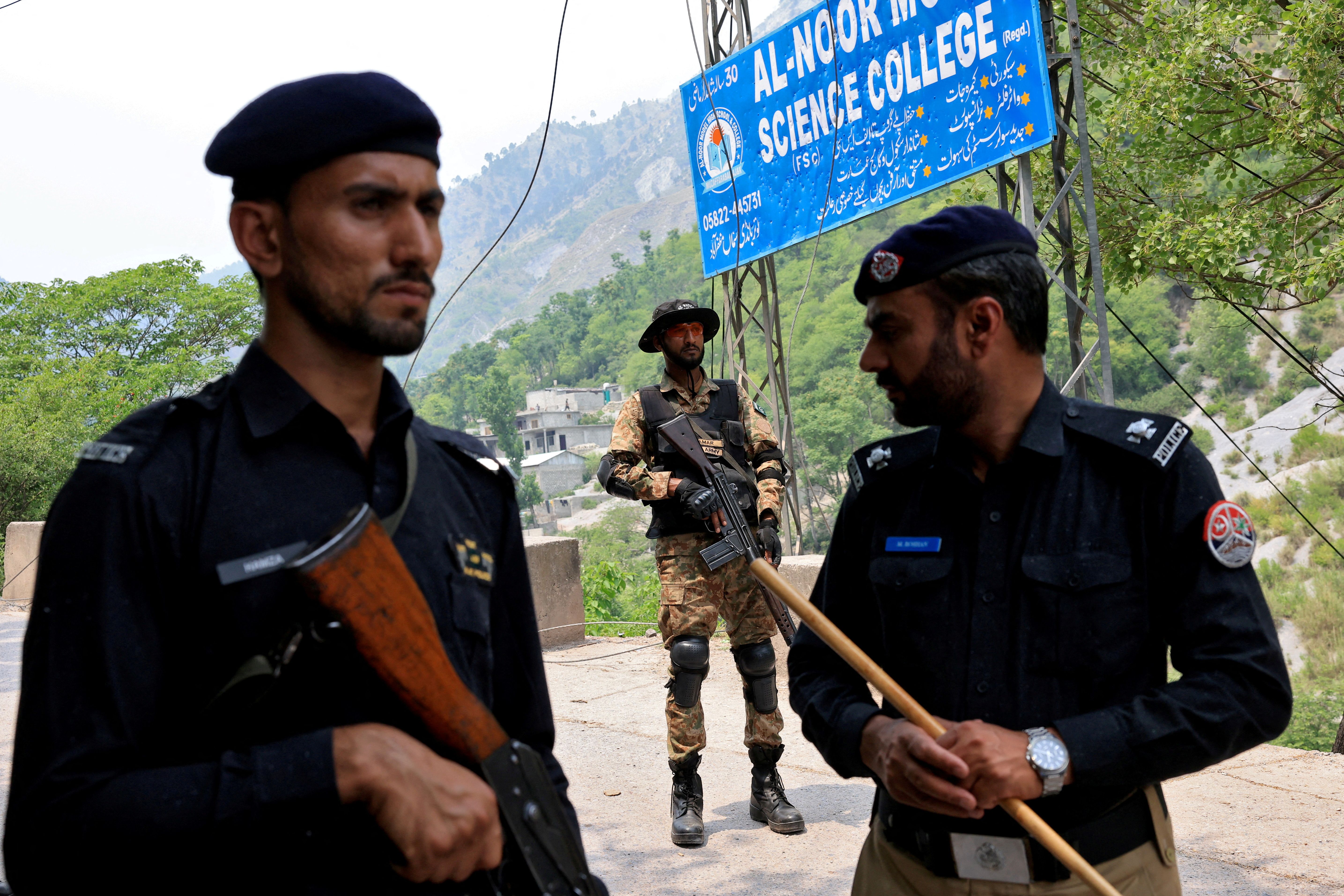 Pakistani security forces stand guard