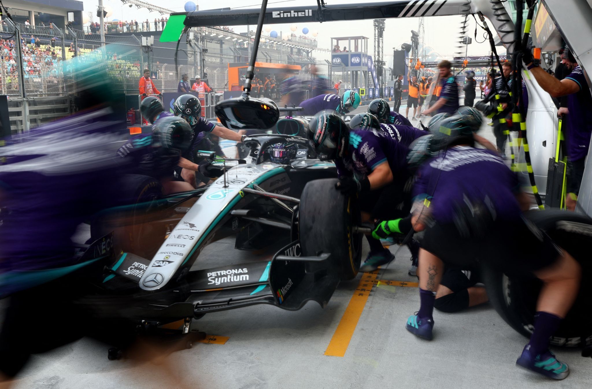 Mercedes’ George Russell makes a pit stop during F1 practice.