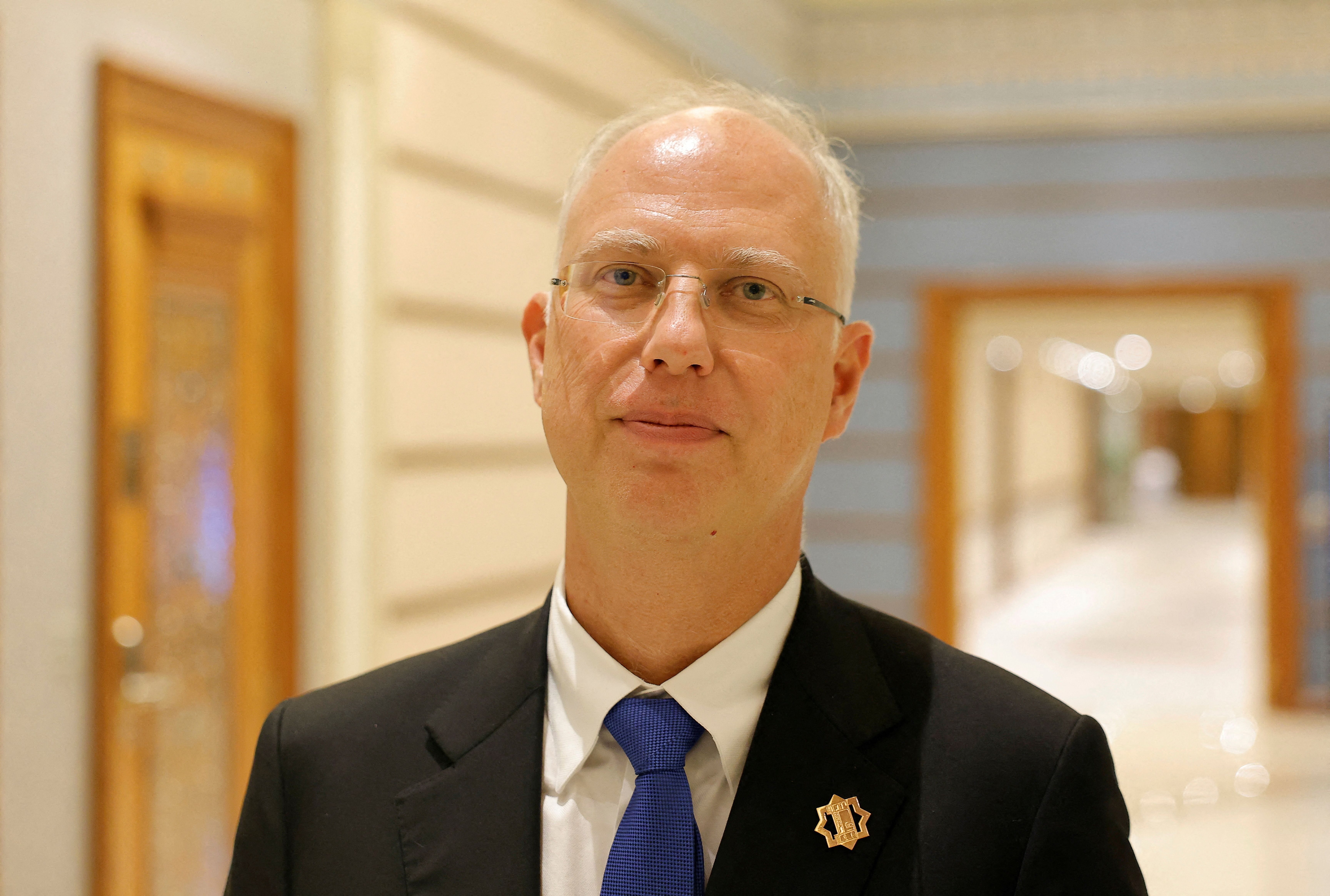 The head of Russia’s sovereign wealth fund Kirill Dmitriev poses for a picture after the U.S.-Russia talks in Riyadh, Saudi Arabia, February 18, 2025.