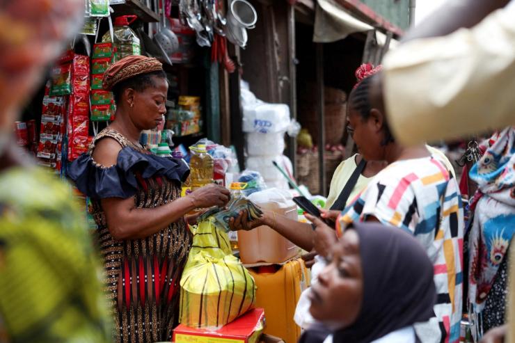 Traders transact at the Mile 12 Market ahead of Muslims festival of sacrifice (Eid Al-Adha) on Ikorodu road in Lagos, Nigeria, June 4, 2025.