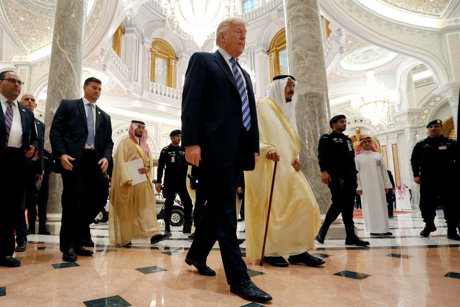 Trump walks with Saudi Arabia’s King Salman to deliver remarks to the Arab Islamic American Summit in Riyadh