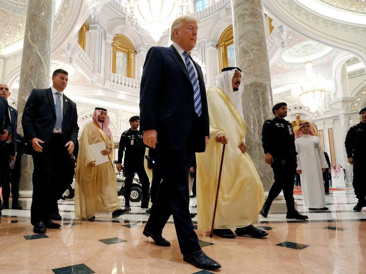 Trump walks with Saudi Arabia’s King Salman to deliver remarks to the Arab Islamic American Summit in Riyadh