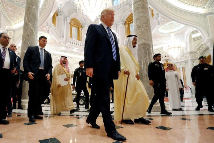 Trump walks with Saudi Arabia’s King Salman to deliver remarks to the Arab Islamic American Summit in Riyadh