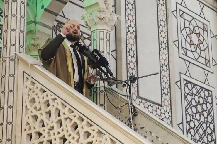 Mohammed al-Bashir delivers the Friday sermon at the Umayyad Mosque in Damascus.