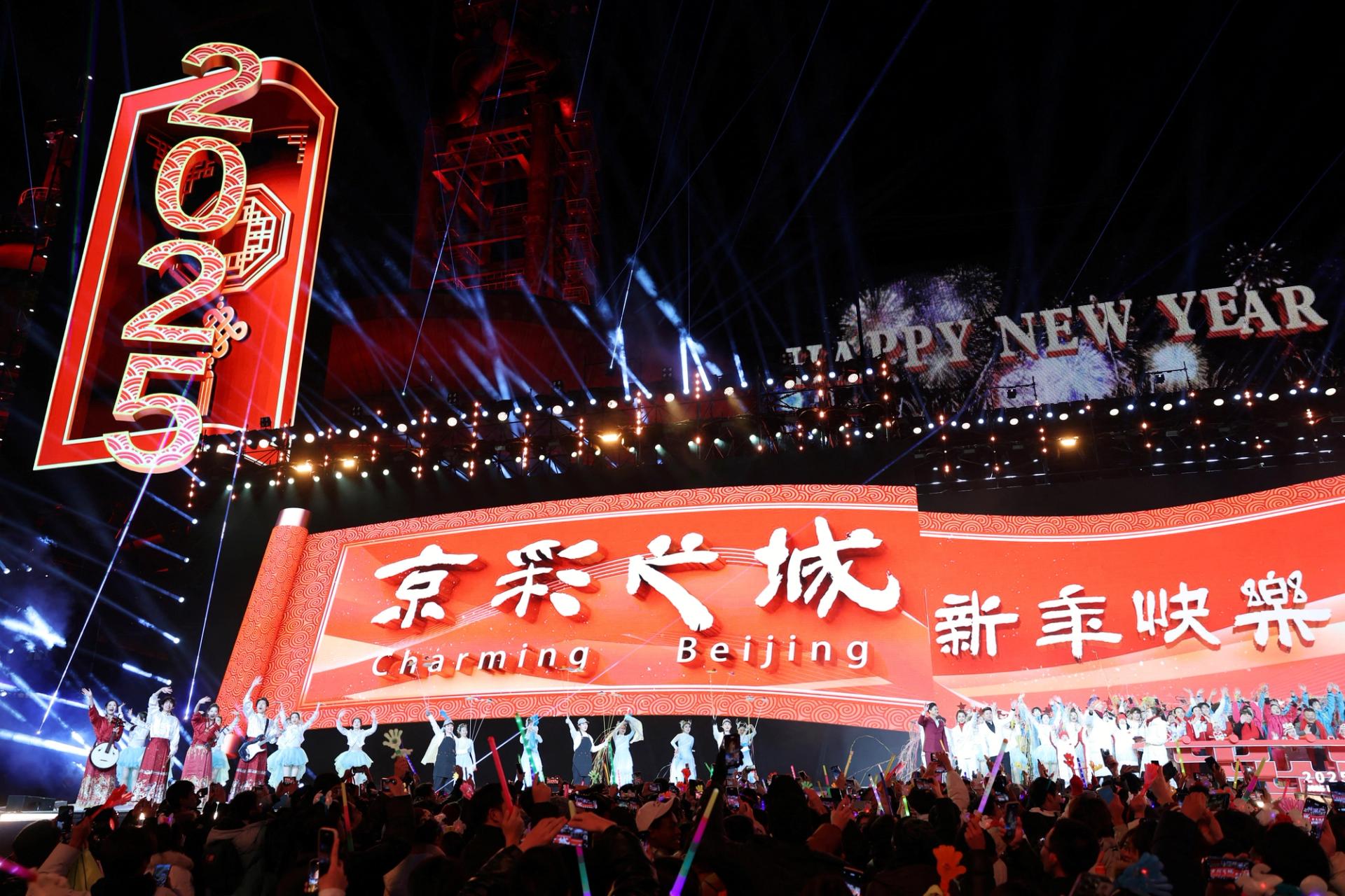 Spectators cheer during a New Year countdown celebration event in Beijing.