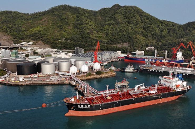 A drone view shows a Chinese-flagged oil tanker