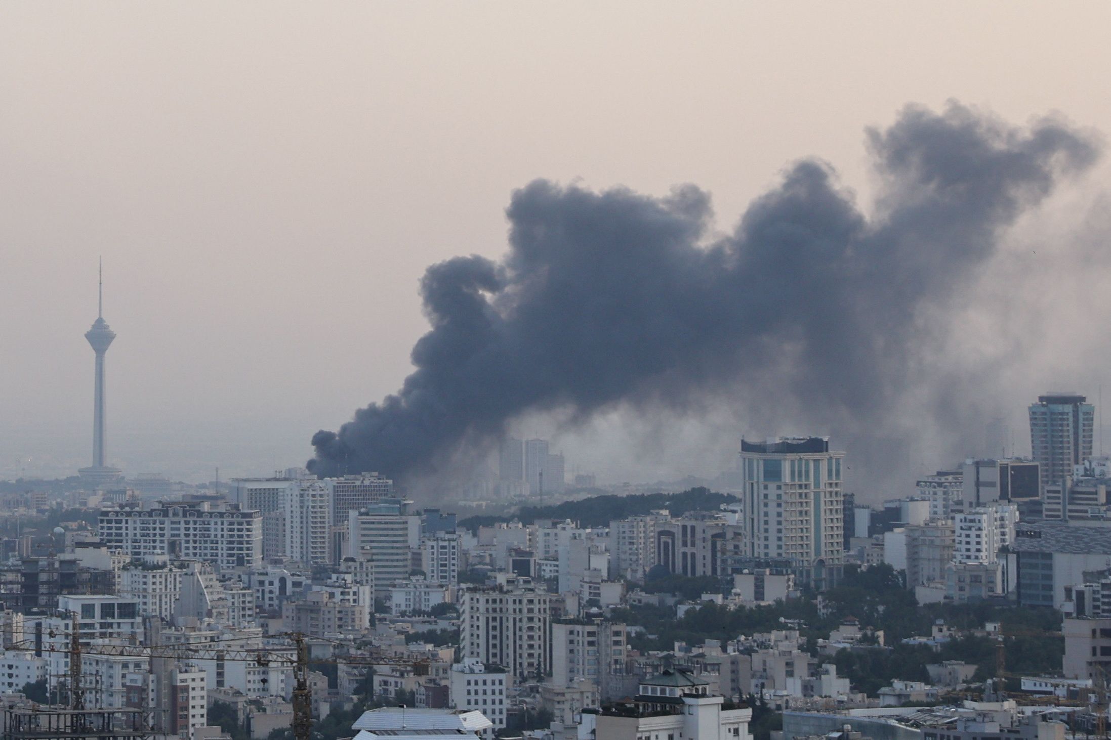 Smoke rises following an Israeli attack on the IRIB building.