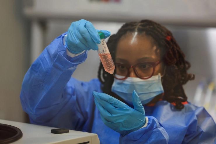 Scientific officer Anathi Nkayi works in the research lab at the University of Cape Town’s Institute of Infectious Disease and Molecular Medicine, in Cape Town, South Africa February 17, 2025.