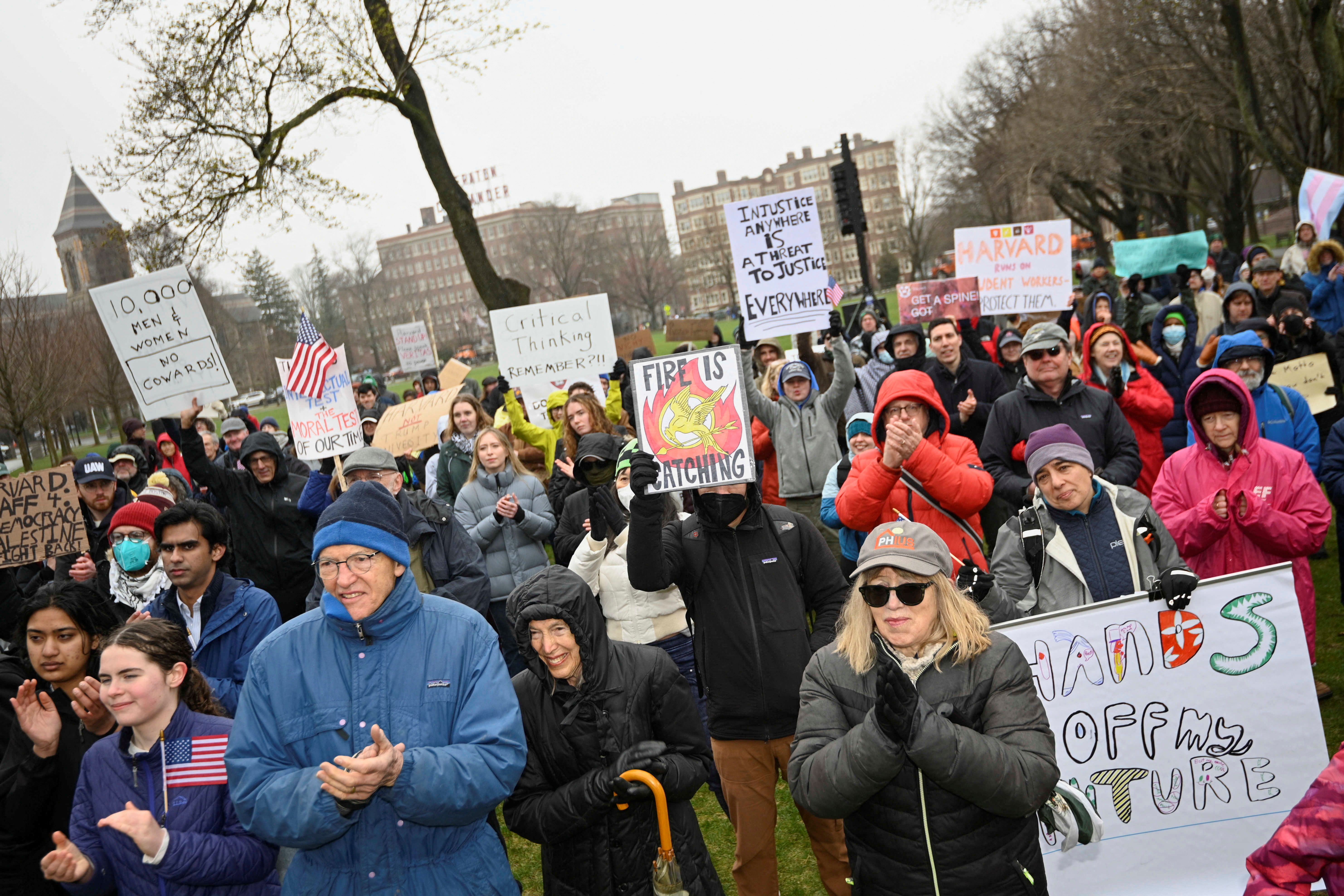 Protestors gather in Cambridge to oppose the federal government’s actions against Harvard.