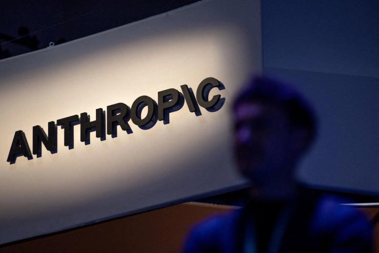 An Anthropic logo displayed on a wall