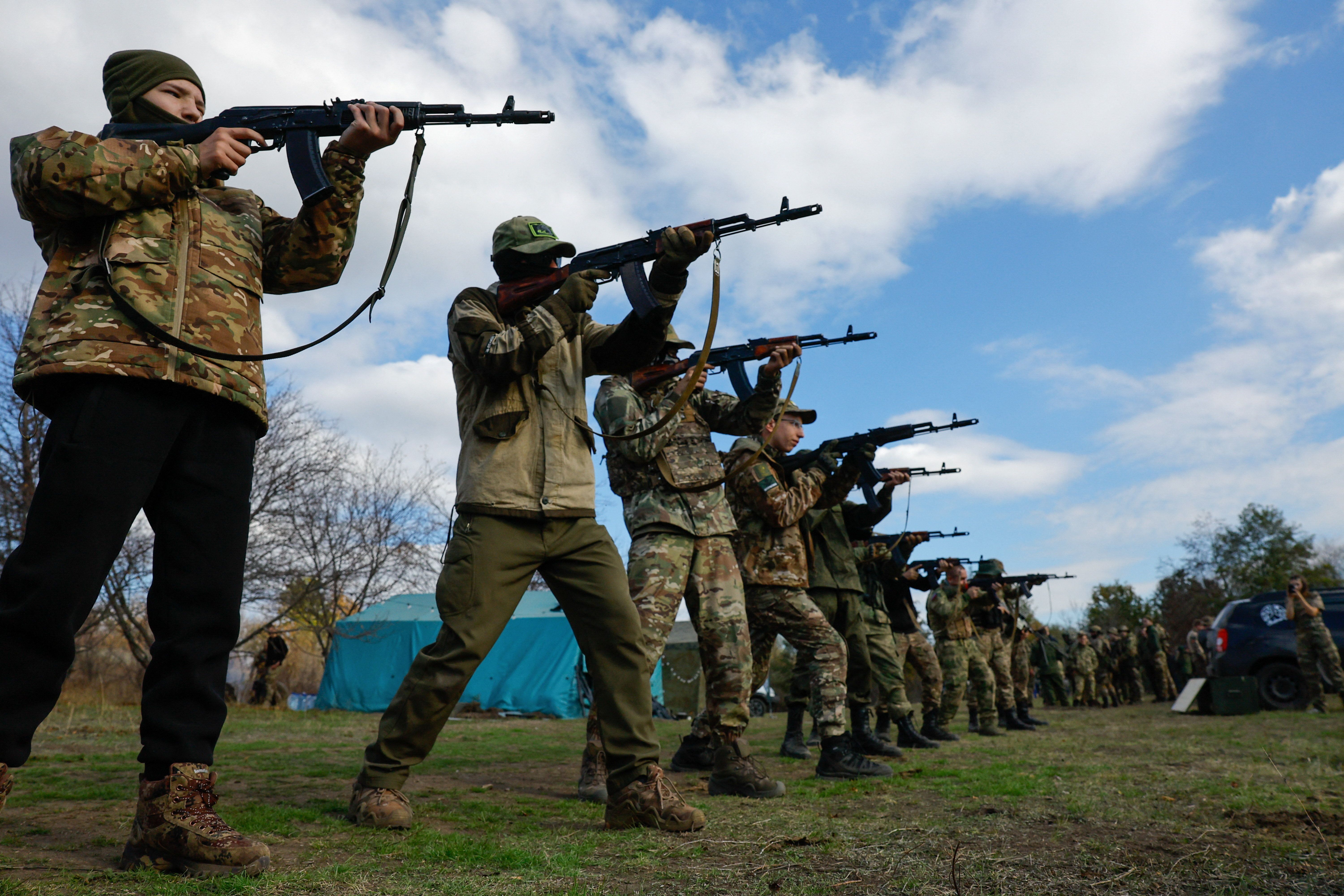 Youngsters undergo a training course at a Russian military-patriotic camp in the Donetsk region, a Russian-controlled area of Ukraine, on Oct. 18, 2025. 