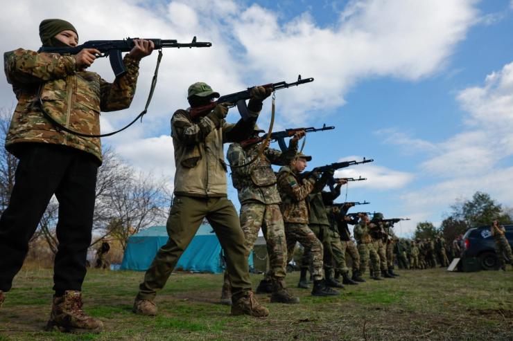 Youngsters undergo a training course at a Russian military-patriotic camp in the Donetsk region, a Russian-controlled area of Ukraine, on Oct. 18, 2025.