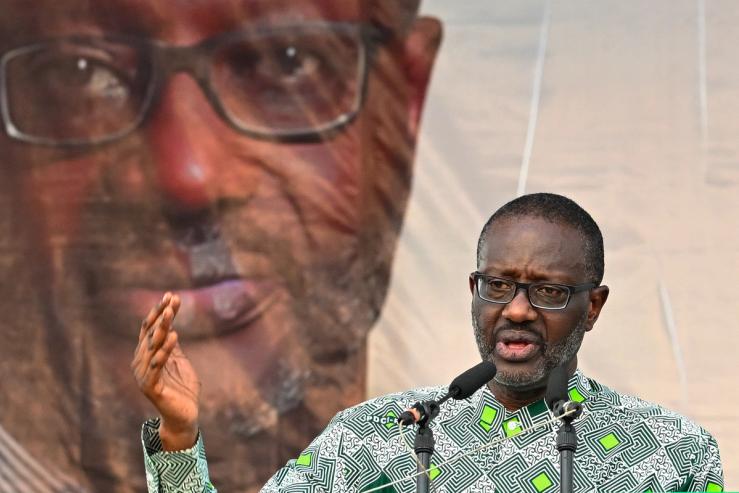 Côte d’Ivoire presidential candidate Tidjane Thiam delivers a speech on stage during a political rally in Aboisso on Dec. 21, 2024.
