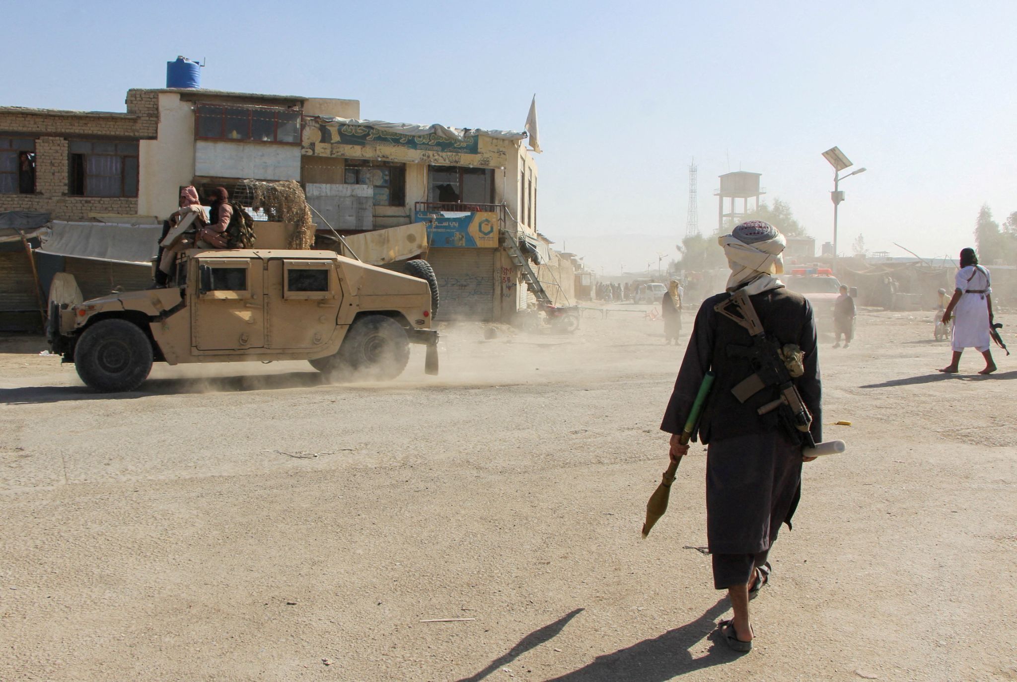 Taliban patrol Afghan border. 