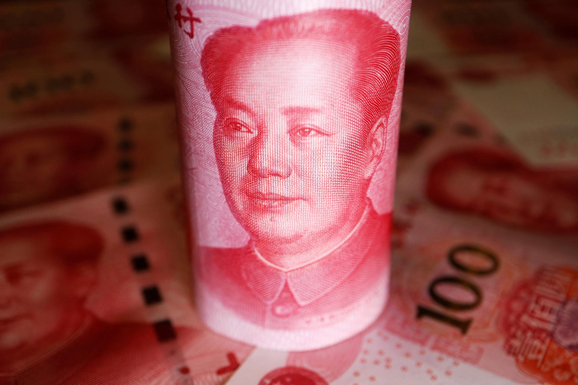 FILE PHOTO: Chinese Yuan banknotes are seen in this illustration picture taken June 14, 2022. REUTERS/Florence Lo/Illustration/File Photo