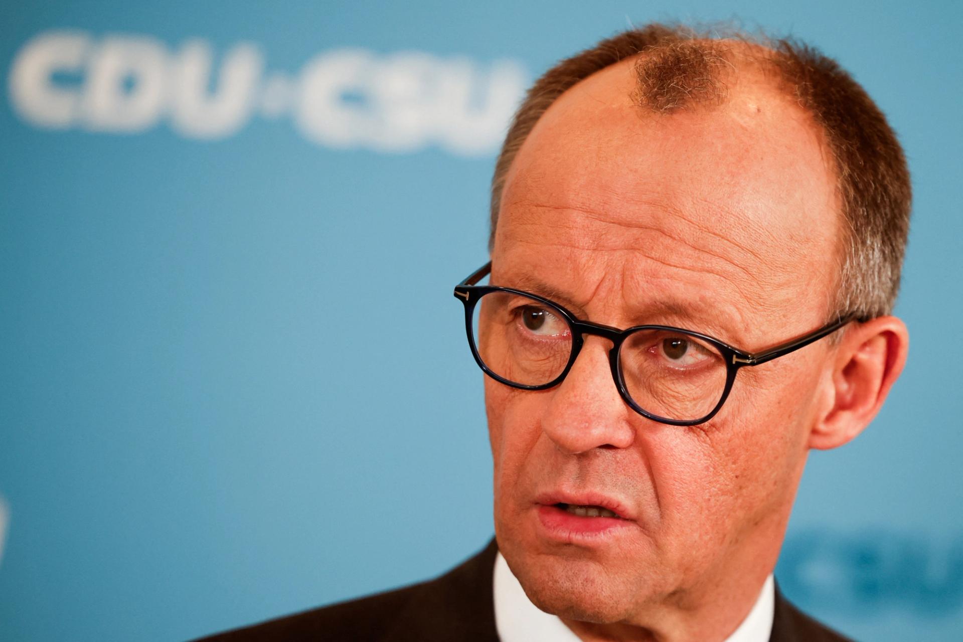 German Chancellor-in-waiting Friedrich Merz attends a press conference after he reached an agreement with the Greens on a massive increase in state borrowing just days ahead of a parliamentary vote next week, in Berlin, Germany, March 14, 2025.