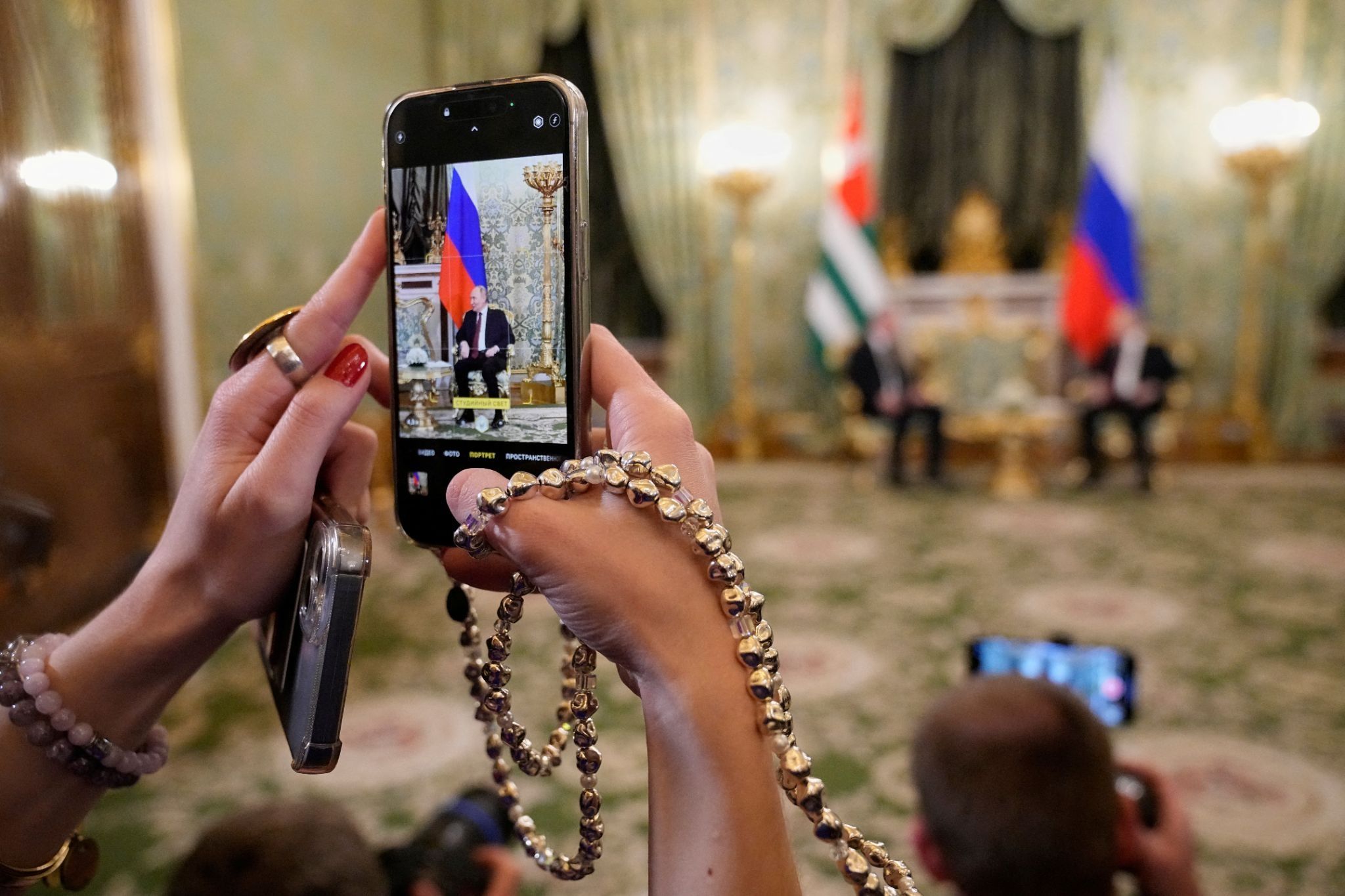 A journalist records Vladimir Putin