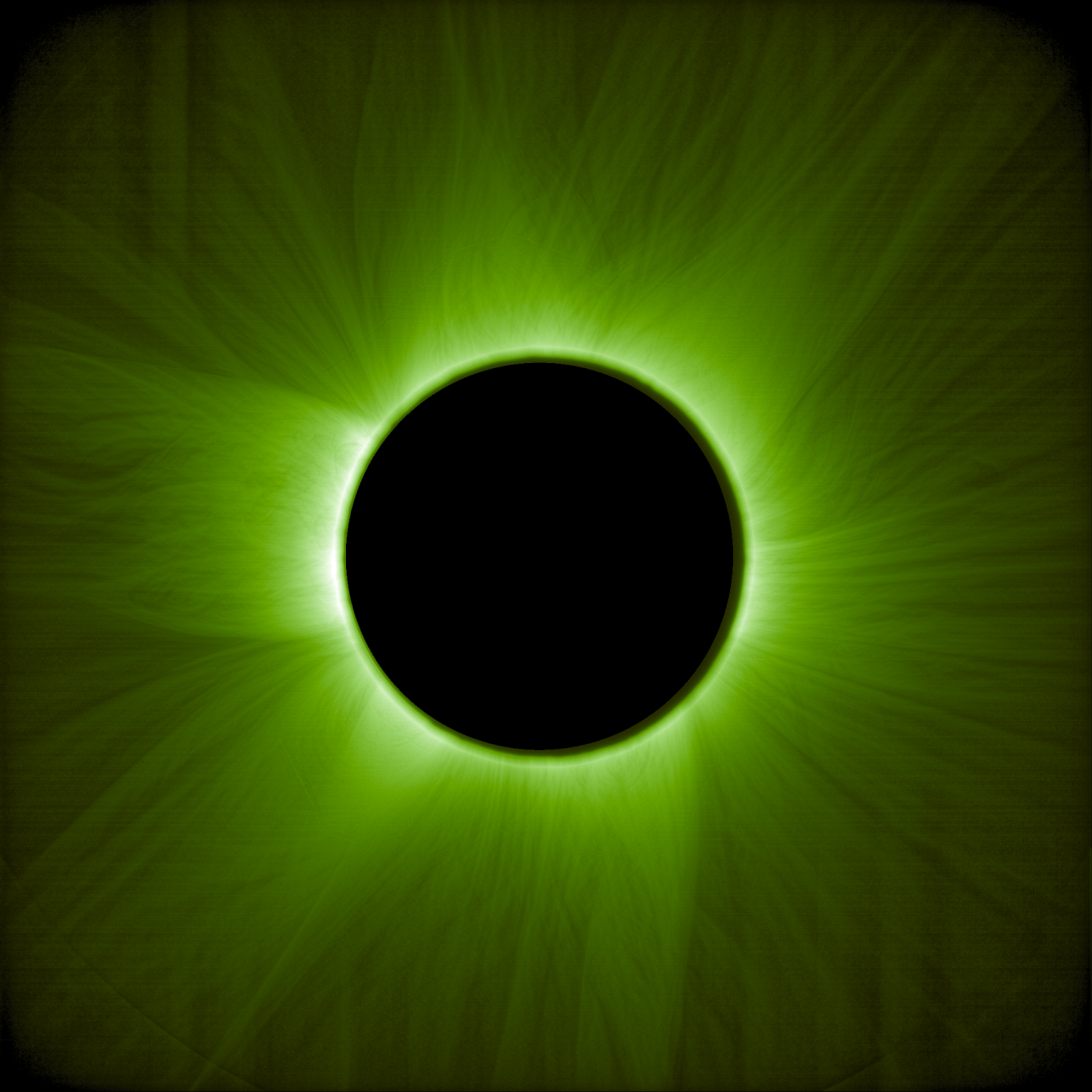 The sun’s corona, shown similarly to how a human eye would see it during an eclipse, but through a green filter