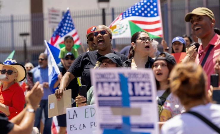 People protesting against ICE immigration raids in Los Angeles.