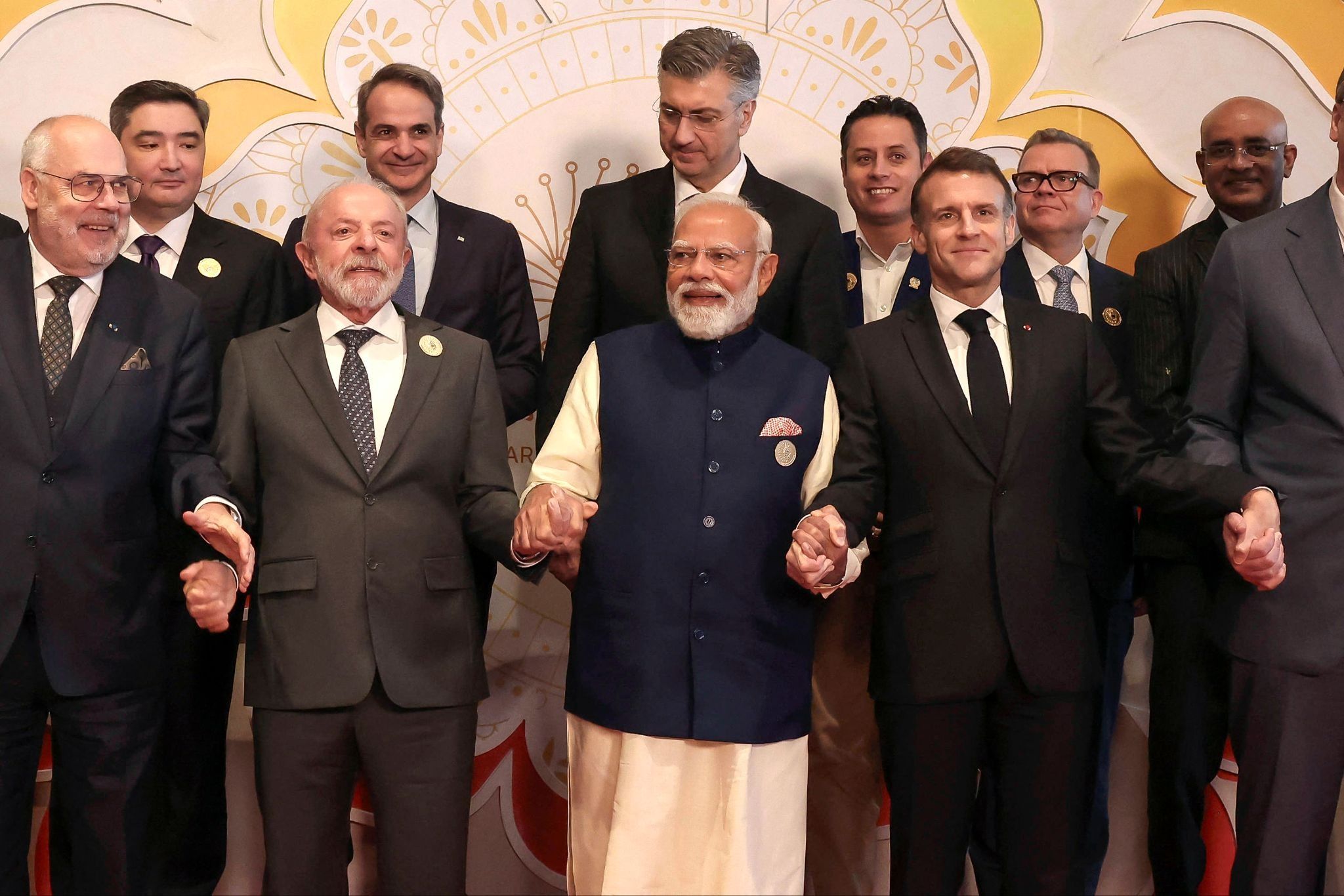 Brazil’s president, India’s prime minister, and France’s president during the AI Impact Summit in New Delhi. Stephane Lemouton/AFP via Getty Images