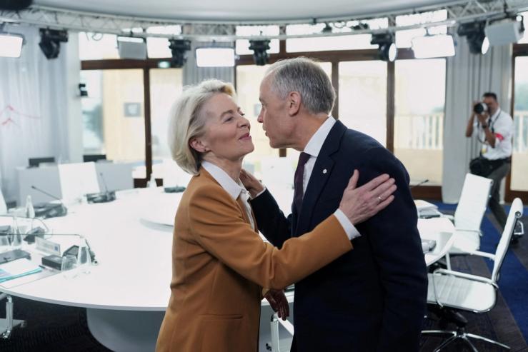 Canadian Prime Minister Mark Carney, greets European Commission President Ursula von der Leyen.
