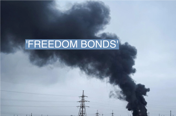 Smoke rises in the sky over a high-voltage line at the site of a Russian missile strike outside Kharkiv, Ukraine, on March 22, 2024.