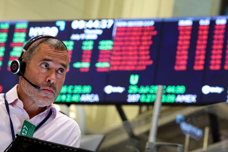 A futures-options trader works on the floor at the American Stock Exchange.