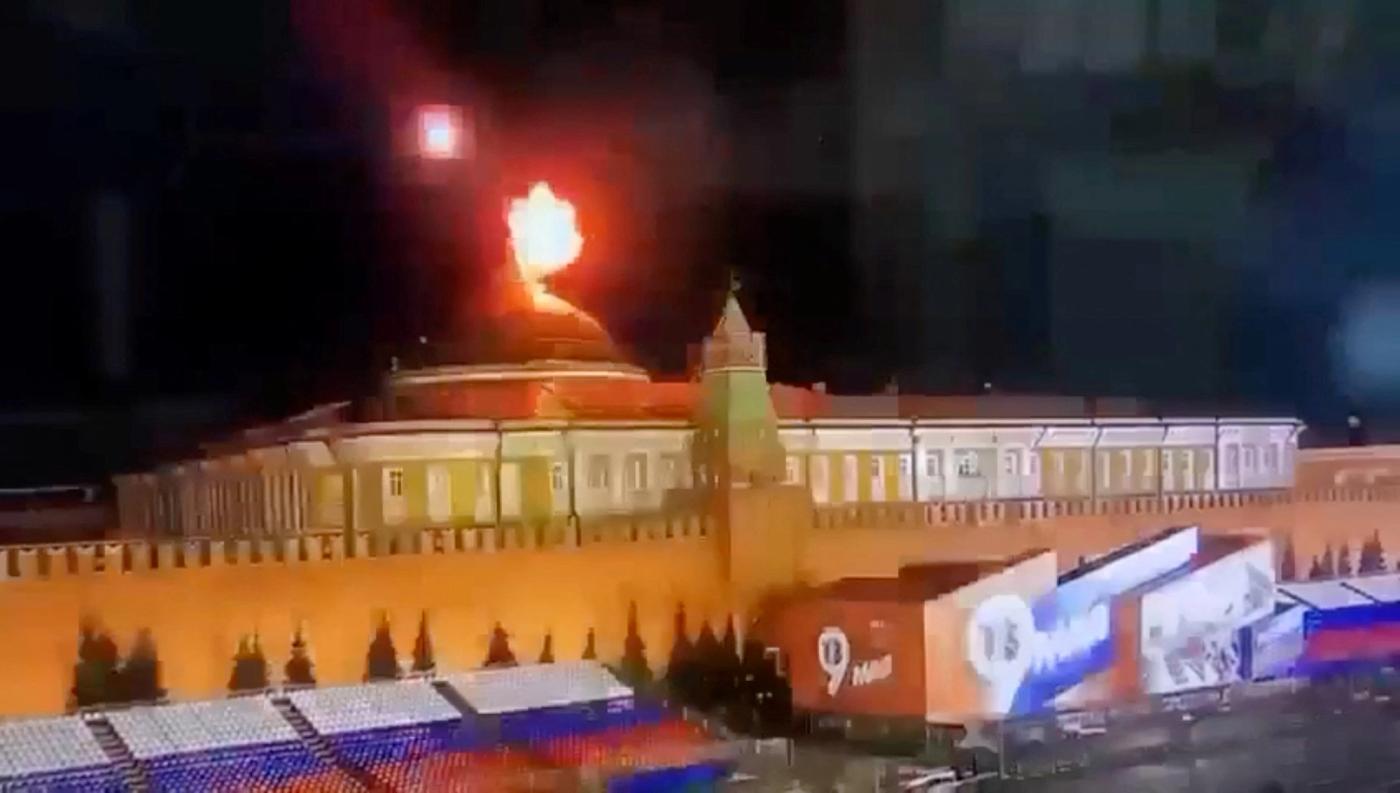 A still image taken from video shows a flying object exploding in an intense burst of light near the dome of the Kremlin Senate building during the alleged Ukrainian drone attack in Moscow, Russia, in this image taken from video obtained by Reuters May 3, 2023. Ostorozhno Novosti/Handout via REUTER