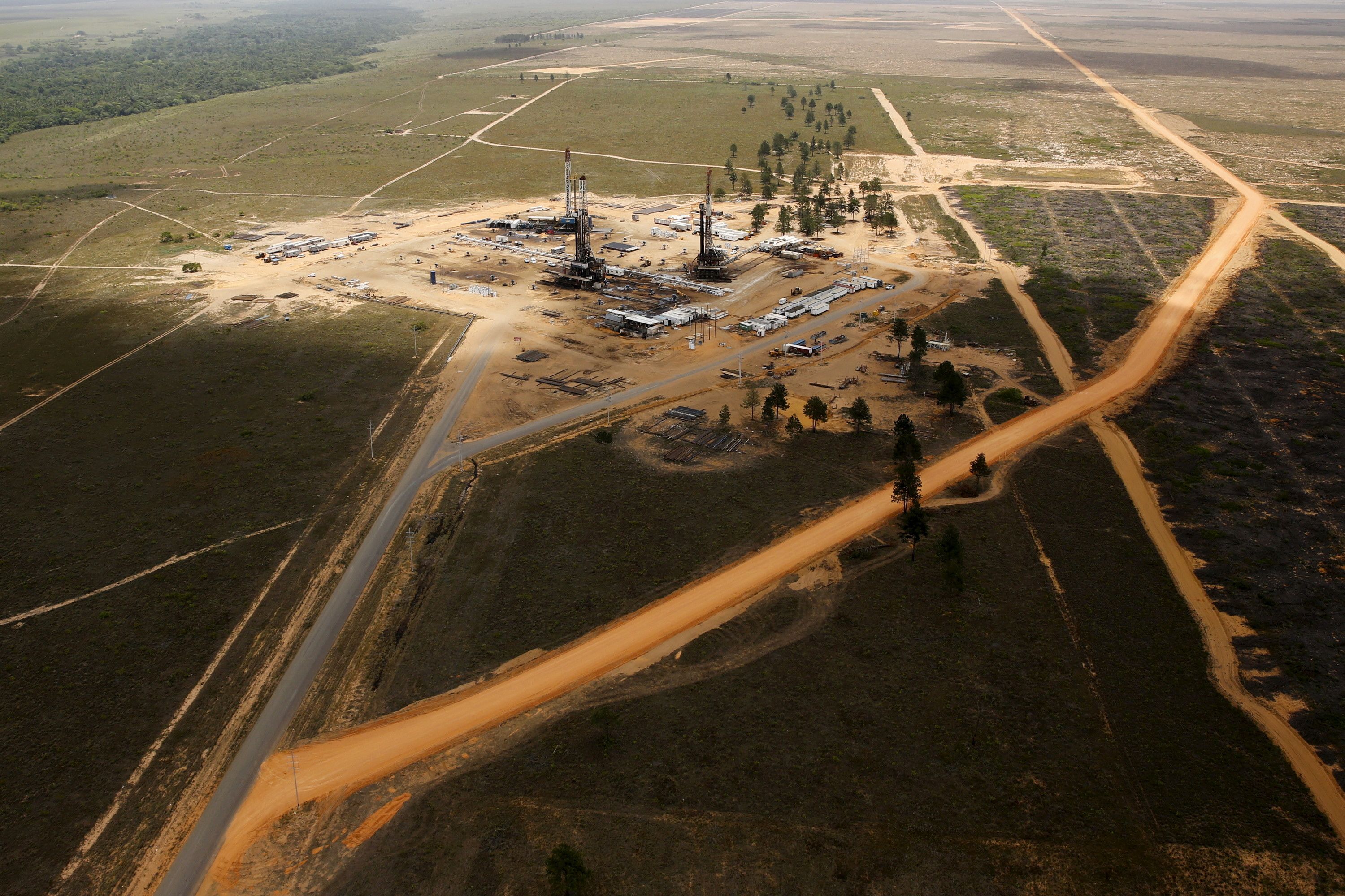 Drilling rigs are seen at an oil well operated by Venezuela’s state oil company PDVSA.