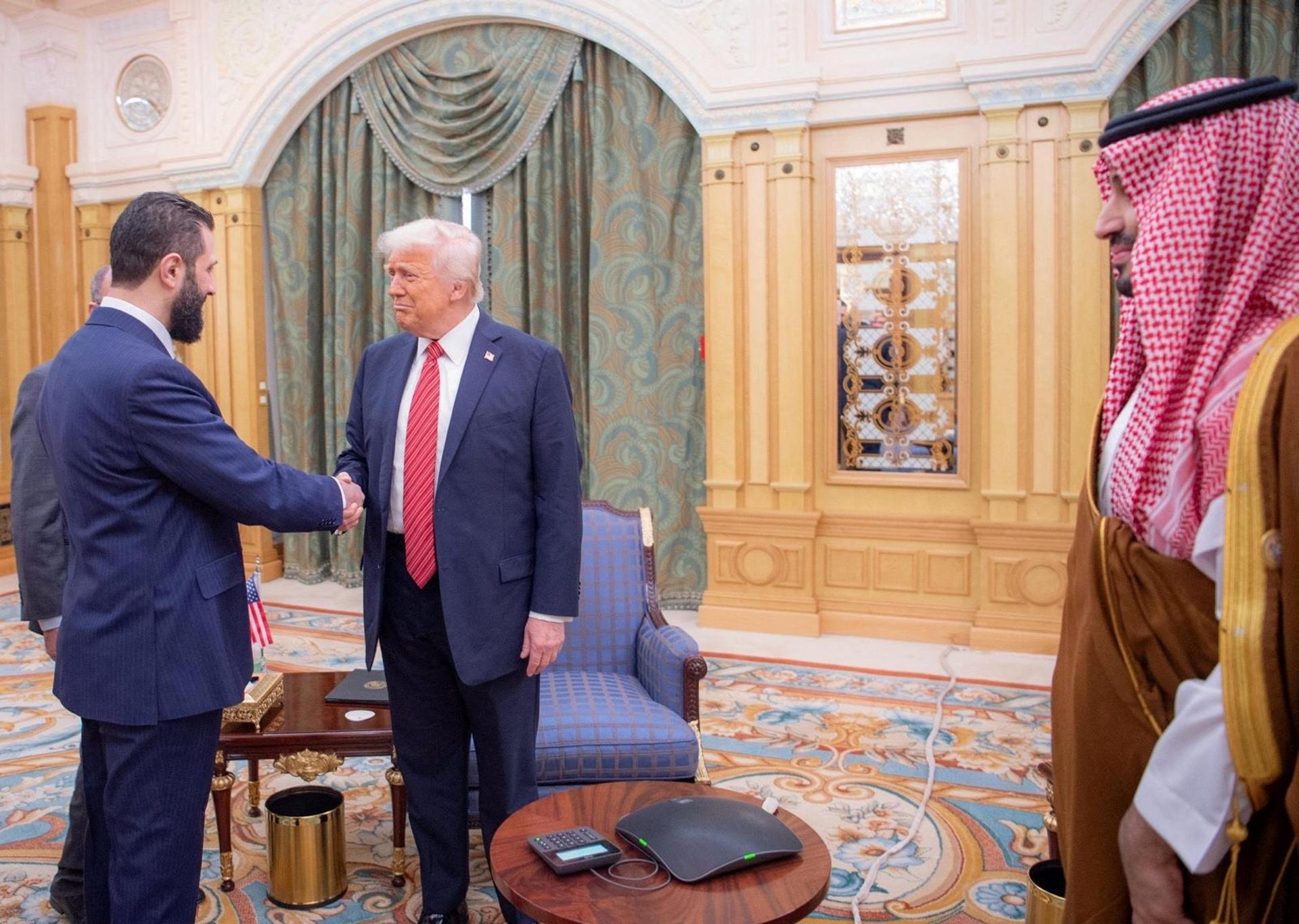 President Donald Trump meets with Syrian President Ahmed al-Sharaa in Riyadh, Saudi Arabia, in this handout released on May 14, 2025.