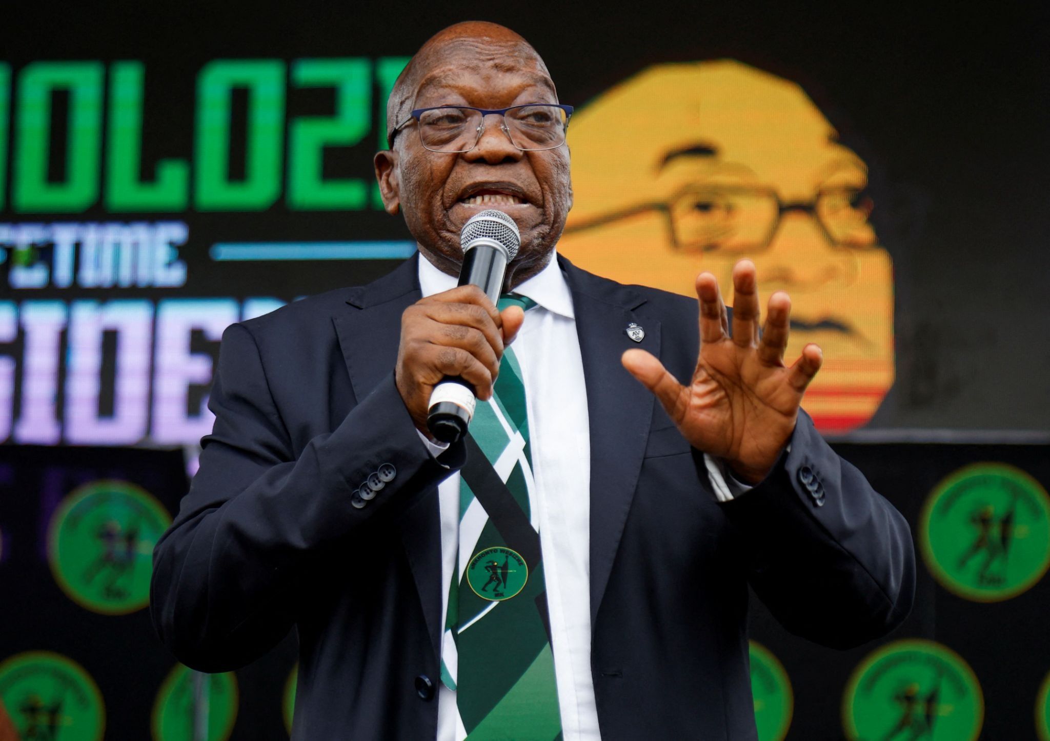 Former South African President Jacob Zuma addresses supporters in front of the High Court in Pietermaritzburg.